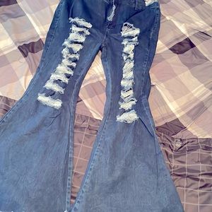 Dark blue ripped flare/wide leg jeans
